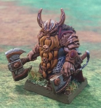 Dwarf Lord Magn Redroar of Stoneriver Hold. He is a borderline berserk this one, his fury is rather well known across Dwarfdom.
